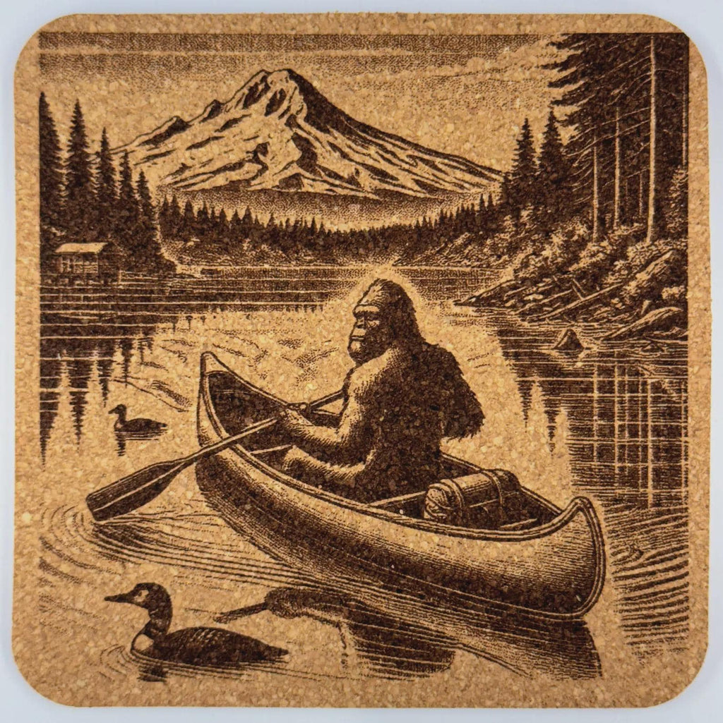 Bigfoot Canoeing Cork Coaster – Sasquatch Paddling Mt Hood Lake Scene