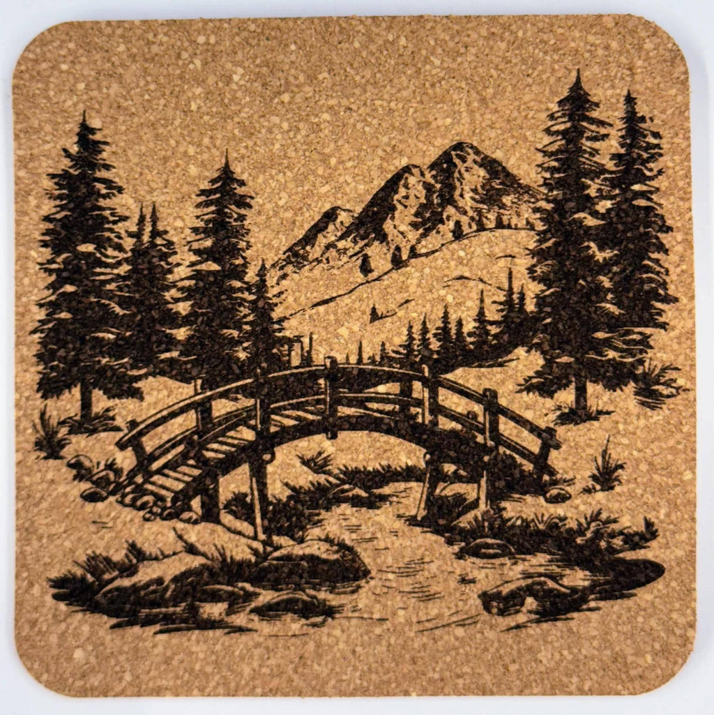 Mountain Bridge Coaster – Engraved Cork Coaster with Forest and Alpine Scene