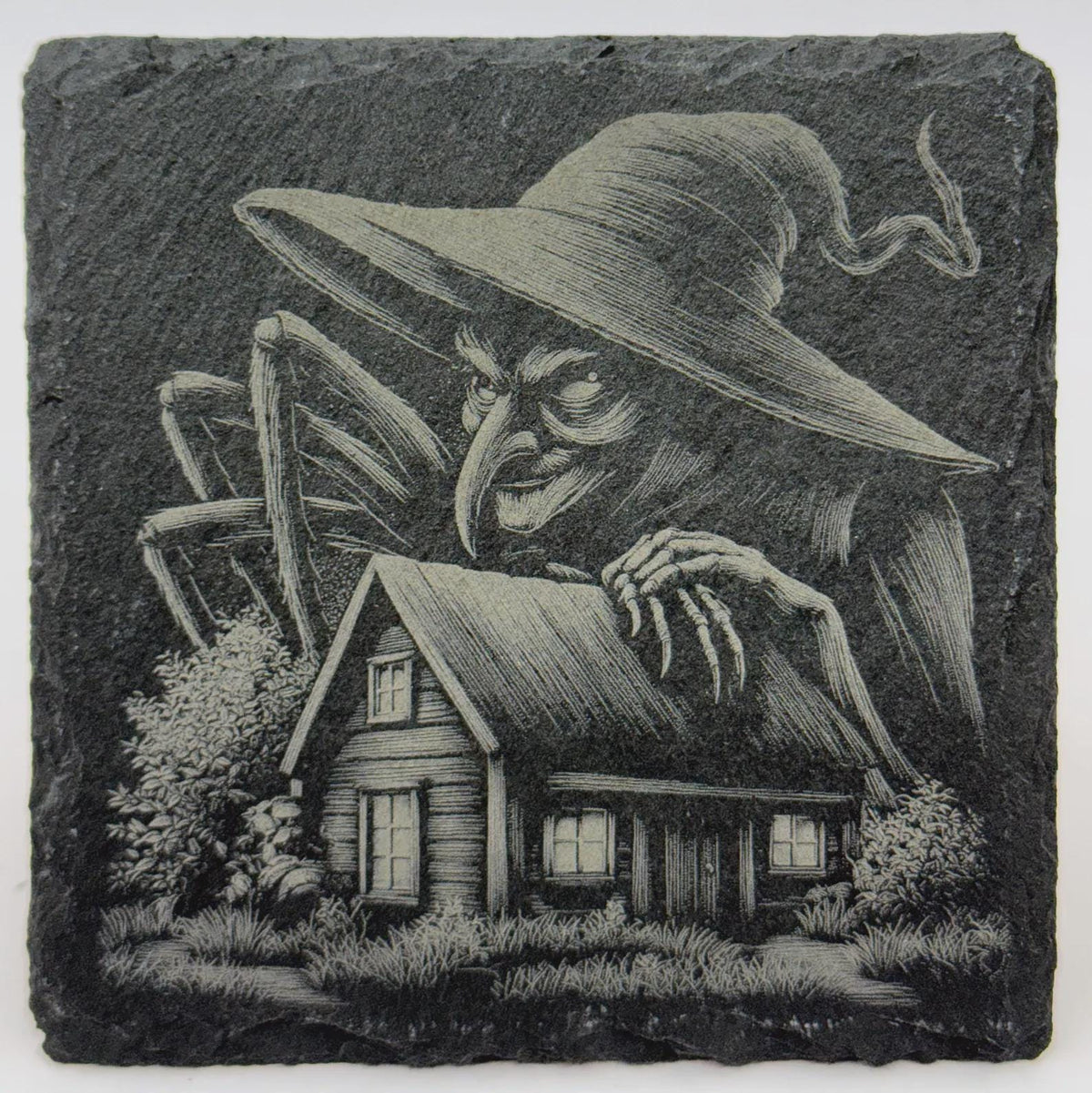 Witch Looming Over a Haunted Cottage – Laser Engraved Slate Coaster