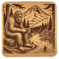 Bigfoot Fishing by the River – Mountain Forest Cork Coaster