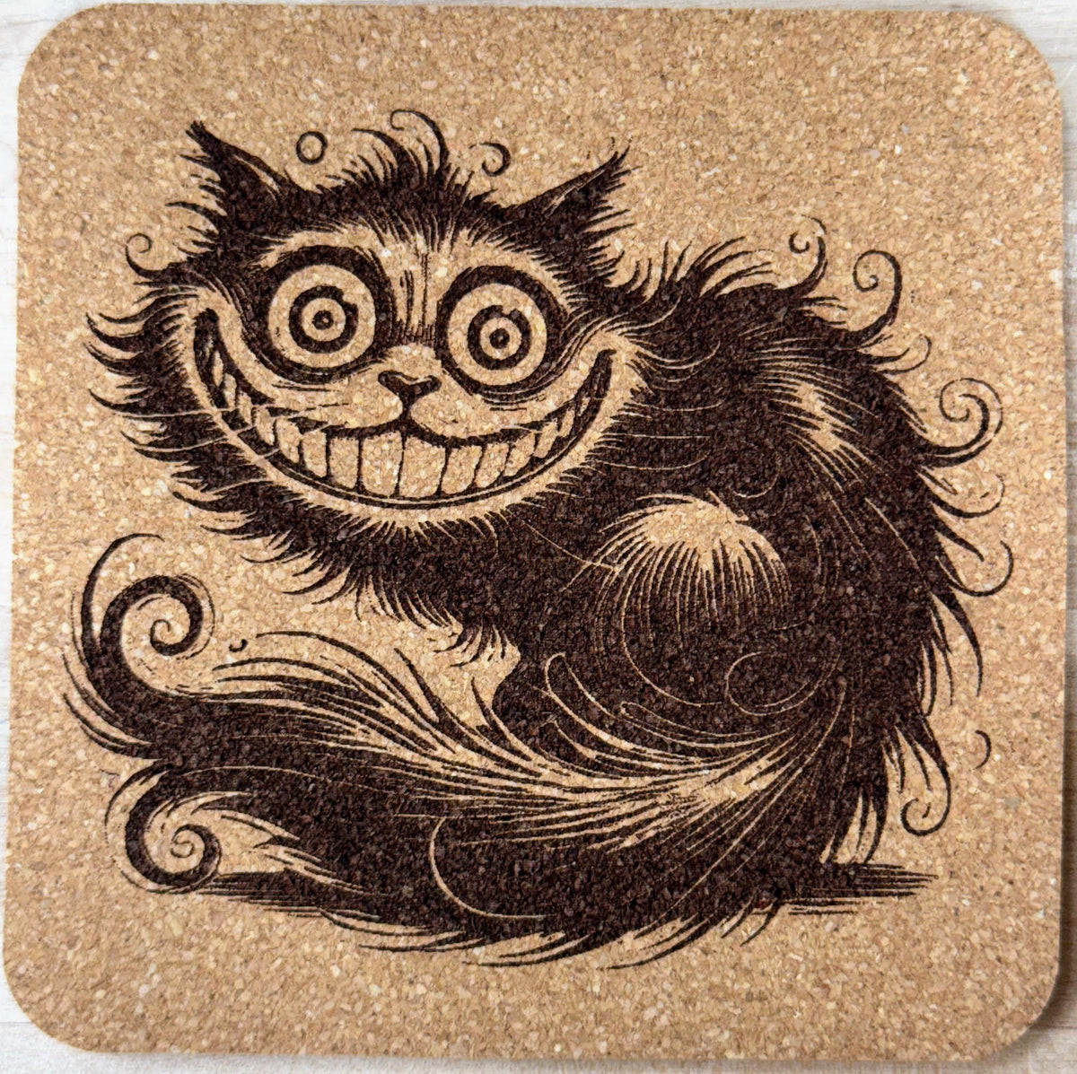 Catnip Cats – Grinning Cheshire Chaos Cork Coaster
